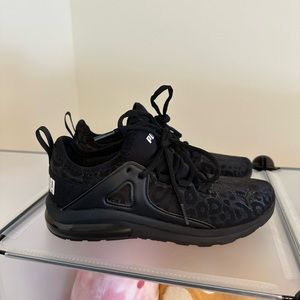 Black cheetah print Pumas